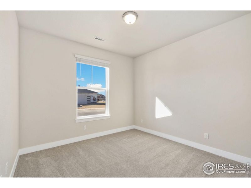 2nd Bedroom with walk-in closet and partial mountain views!