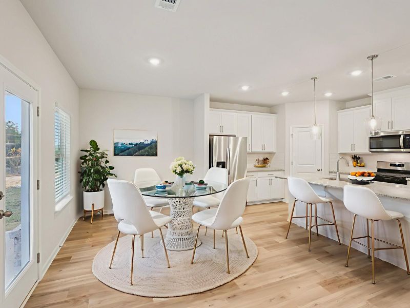 Furnished interior view inside a new home in Vines at Mill Creek - Estate Series, Braselton (Image 4).