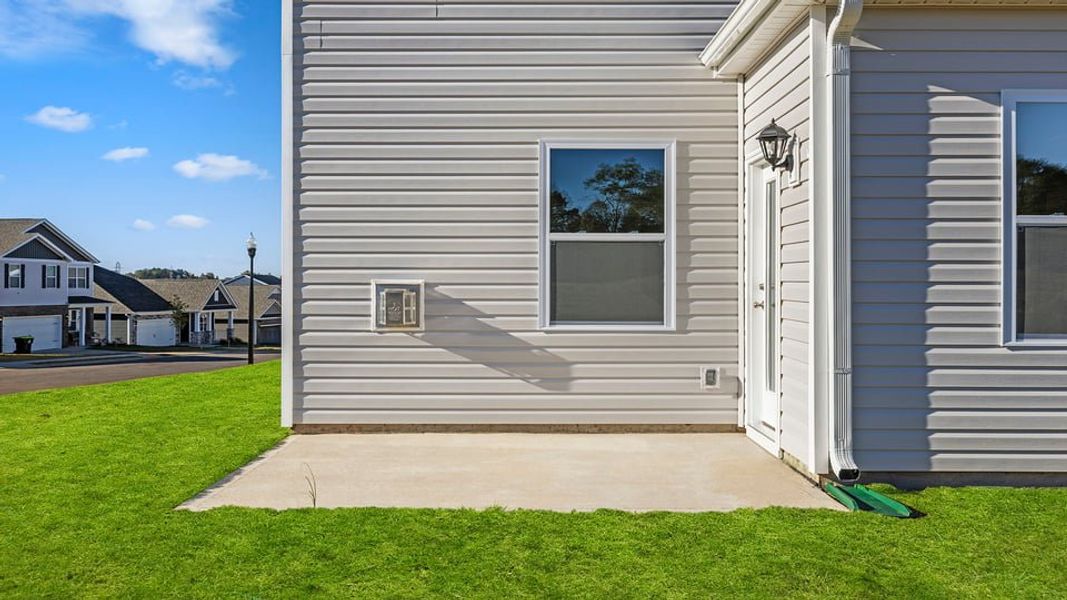 Exterior details and patio area of a home in Sage Grove, Lyman (Image 3).