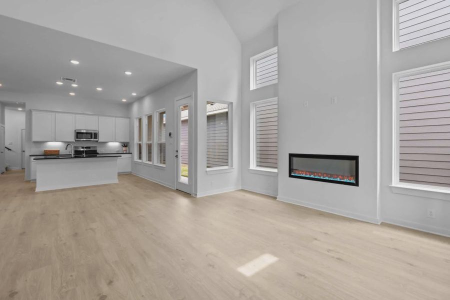 Representative unfurnished interior of a home built from the Ryker by Chesmar Homes in The Crossvine, Forney (Image 6).