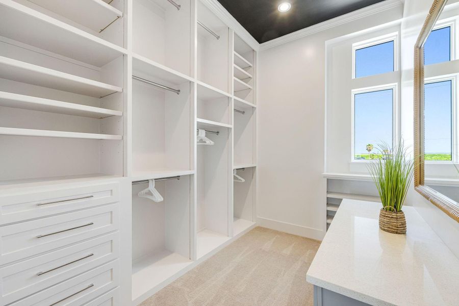 Primary closet with views of the bay.