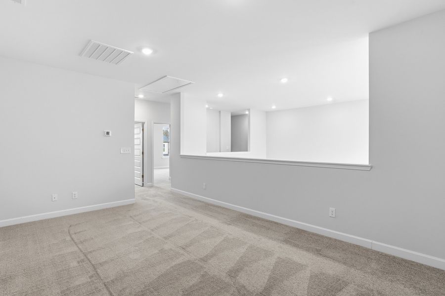 Spacious, unfurnished interior of a new home in Ovation at Sweetbrier, Durham (Image 26).