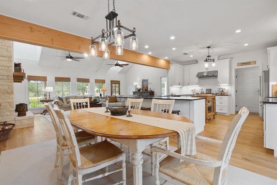 The ample sized dining space in home number one looks out on the open floorplan and also has access to the large outdoor entertaining space