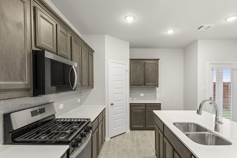 Representative exterior photo of a completed home built from the Willow by Impression Homes in Northspur, Terrell, TX (Image 6). Representative exterior photo of a completed home built from the Willow by Impression Homes in Northspur, Terrell, TX (Image 6).