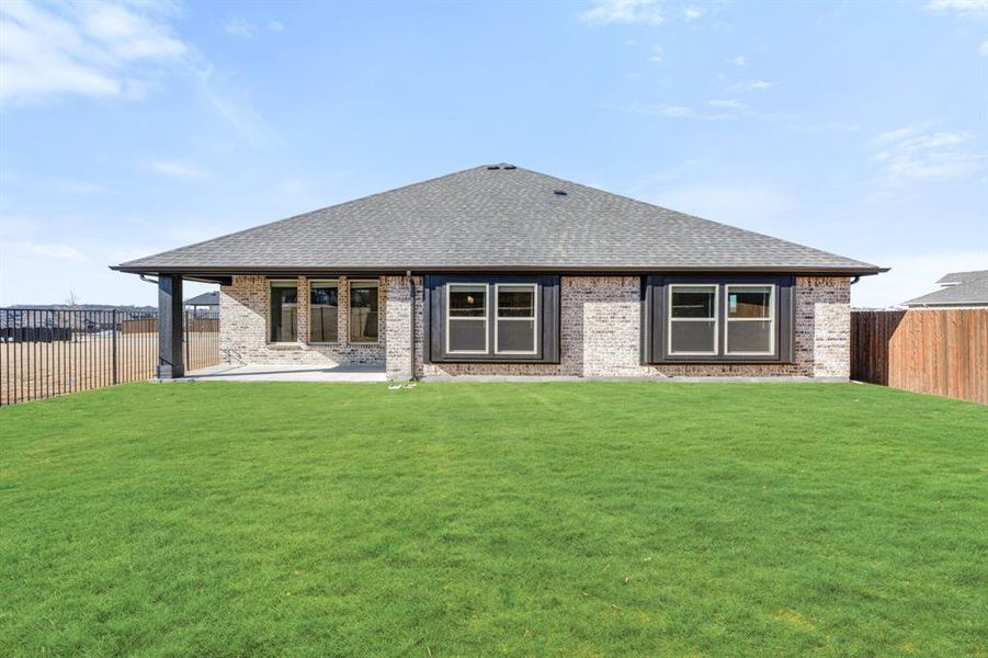 Exterior details and patio area of a home in Parks at Panchasarp Farms, Burleson (Image 21).