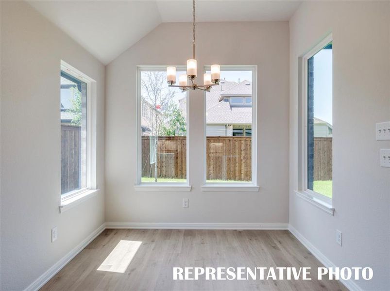With windows everywhere you look, this lovely dining room is prefect for any occasion!  REPRESENTATIVE PHOTO
