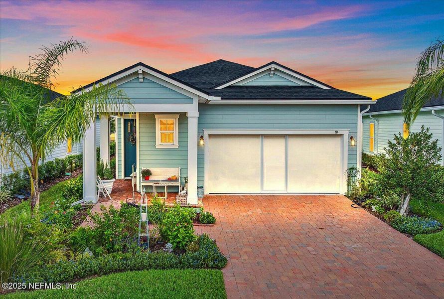Front exterior of a new home in , St. Augustine, FL, highlighting curb appeal (Image 1).