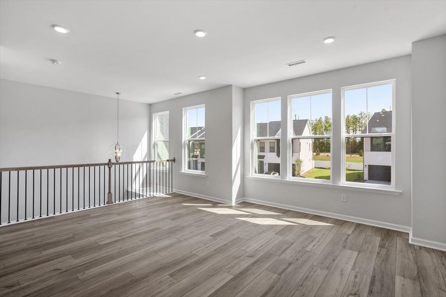 Spacious, unfurnished interior of a new home in Sweetbrier, Durham (Image 20).