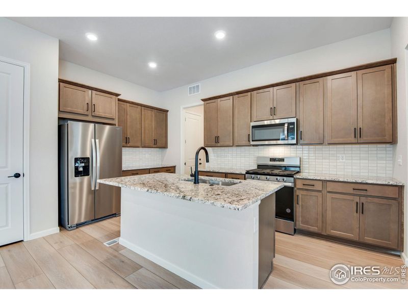 Furnished interior view inside a new home in Westside Crossing Paired Homes, Berthoud (Image 5). Furnished interior view inside a new home in Westside Crossing Paired Homes, Berthoud (Image 5).