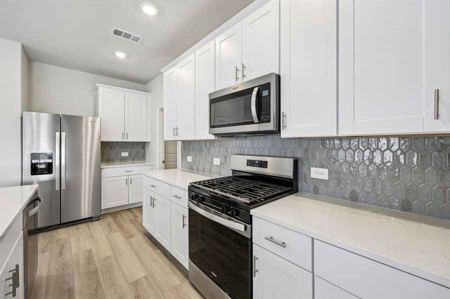 Photo is not of the actual home, but is an inspirational photo of builder’s model home and may depict options, furnishings, and/or decorator features that are not included.