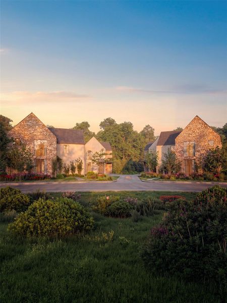 Stone facades and lush landscaping define this picturesque neighborhood at dusk. Stone facades and lush landscaping define this picturesque neighborhood at dusk.