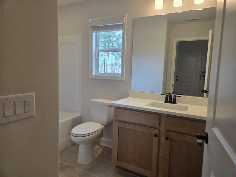 Furnished interior view inside a new home in Madeira, Acworth (Image 7).