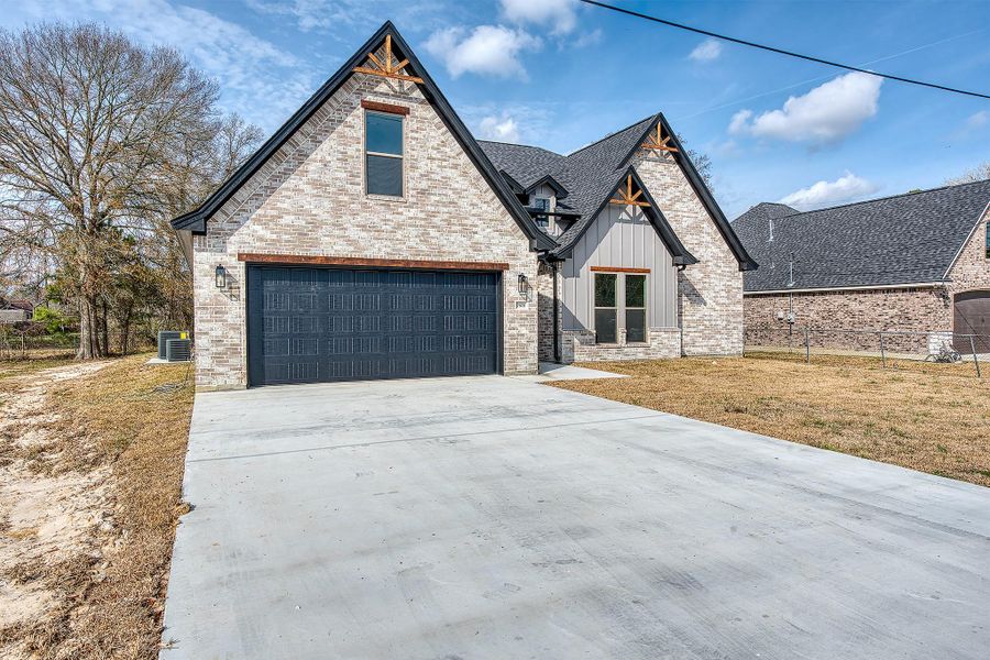 Front exterior of a new home in , Beaumont, TX, highlighting curb appeal (Image 25).