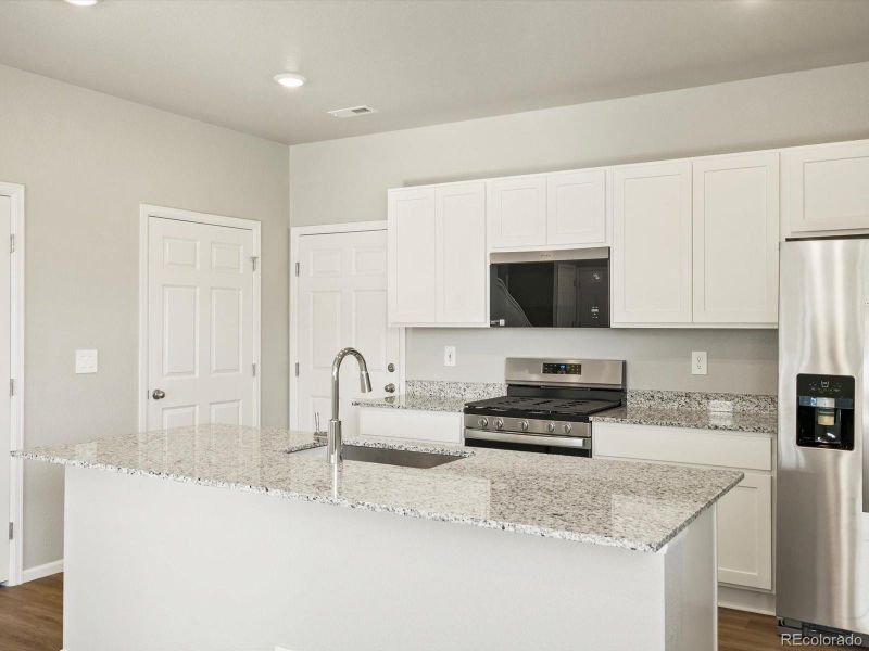 Furnished interior view inside a new home in Poudre Heights: The Meadow Collection, Windsor (Image 7).