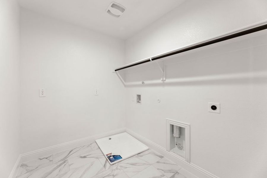 Front exterior of a new home in Main Street Village, Mansfield, TX, highlighting curb appeal (Image 26).