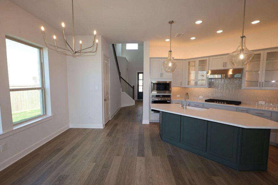 Furnished interior view inside a new home in Prairieland Village - Grove Collection, Cypress (Image 16).