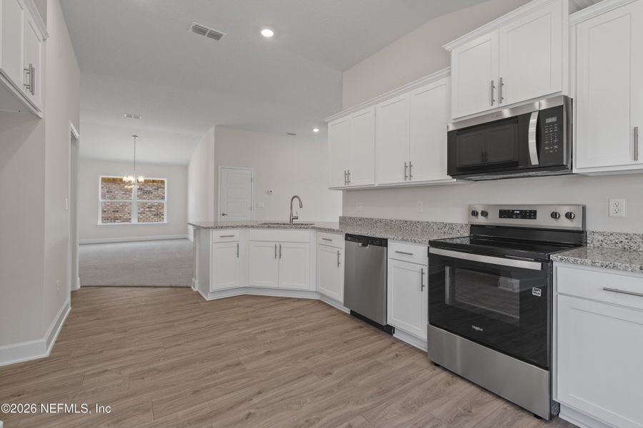 Furnished interior view inside a new home in , Green Cove Springs (Image 9).