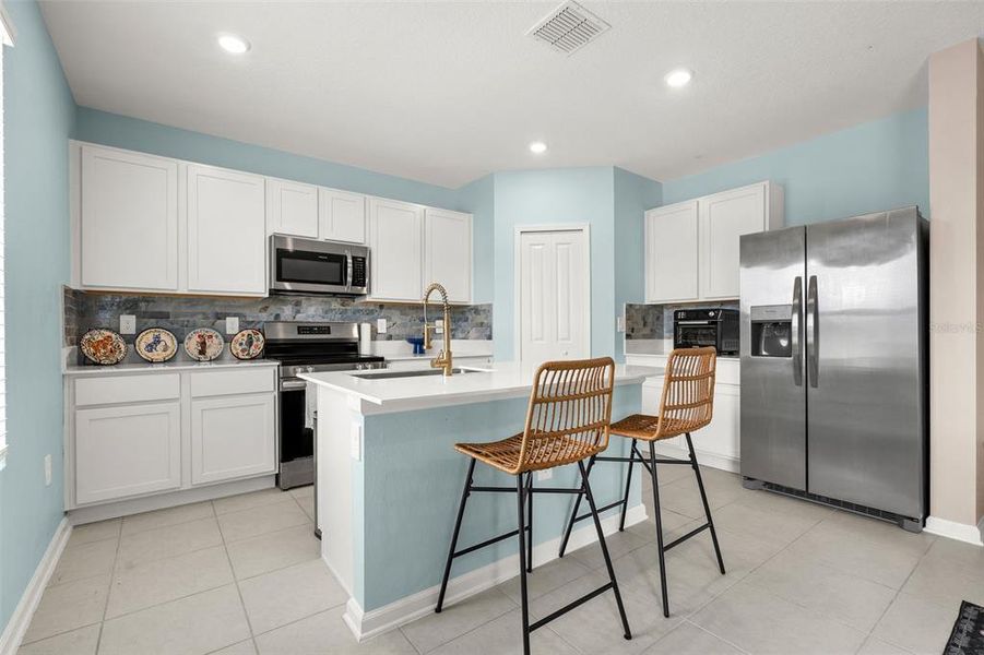 Furnished interior view inside a new home in , Kissimmee (Image 16).