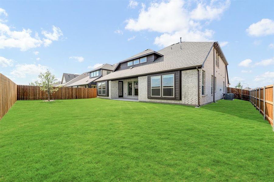 Exterior details and patio area of a home in Wildflower Ranch 60-65, Justin (Image 23). Exterior details and patio area of a home in Wildflower Ranch 60-65, Justin (Image 23).
