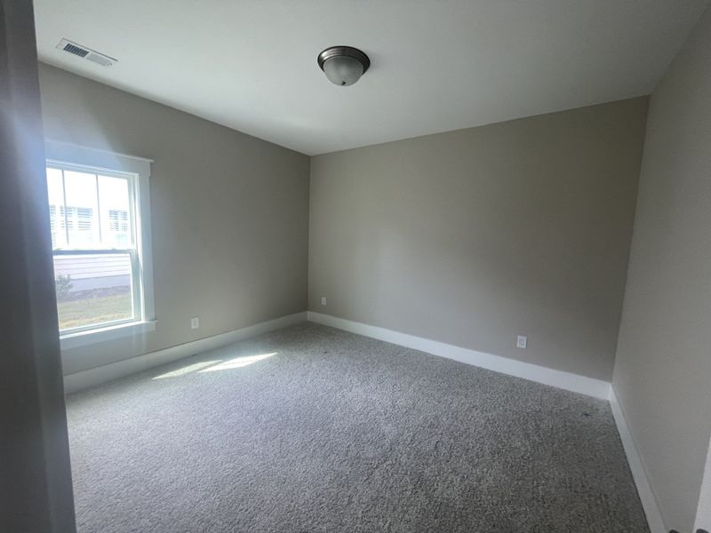 Spacious, unfurnished interior of a new home in The Sanctuary at Sunset Beach, Sunset Beach (Image 9).