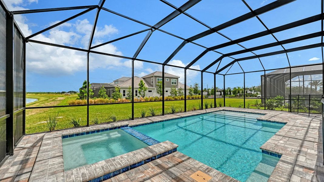 Exterior details and patio area of a home in Palm Grove Real Estate and Homes for Sale in Lakewood Ranch, FL - Neal Communities, Bradenton (Image 21).