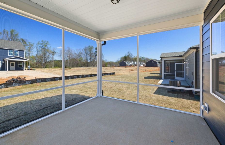 Exterior details and patio area of a home in Exchange at 401, Raleigh (Image 4).
