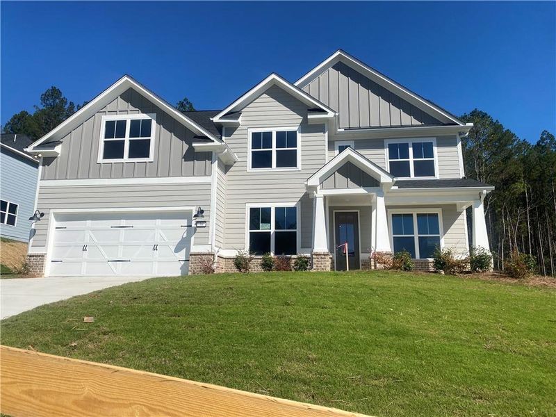 Front exterior of a new home in , Dallas, GA, highlighting curb appeal (Image 2).