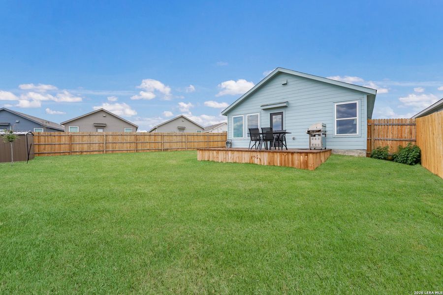 Exterior details and patio area of a home in Spring Grove, Converse (Image 23).