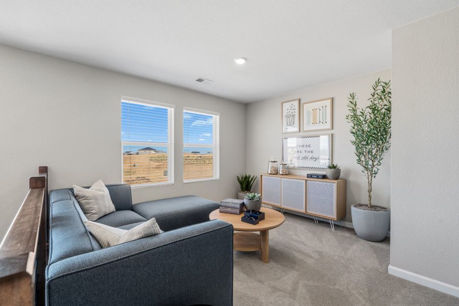 Representative furnished interior of a home built from the 4008 by Risewell Homes in Harvest Crossing, Aurora (Image 9).
