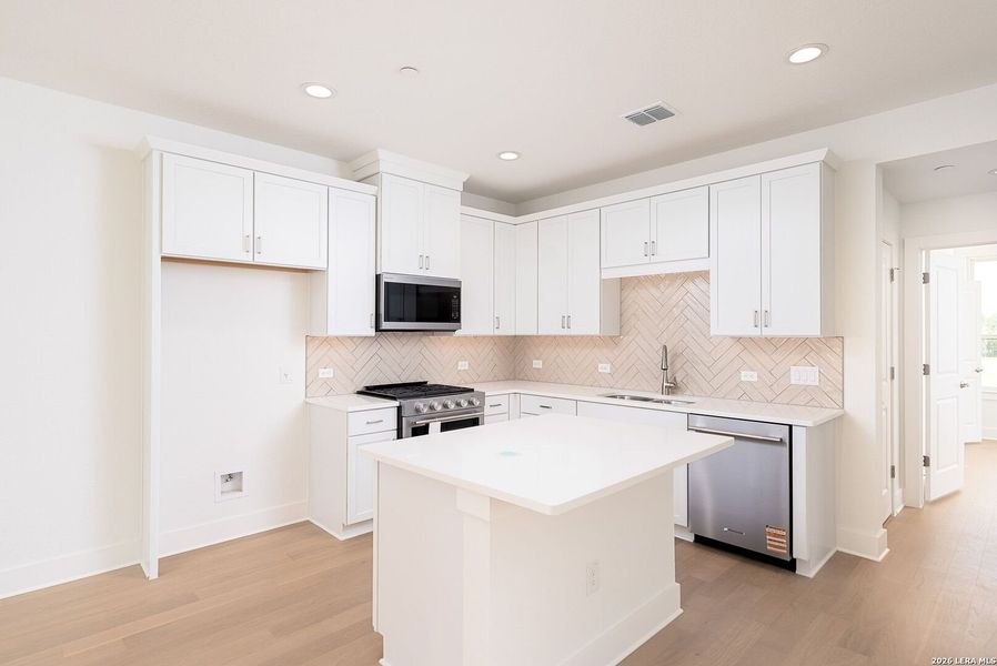 Furnished interior view inside a new home in Victoria Commons, San Antonio (Image 9).