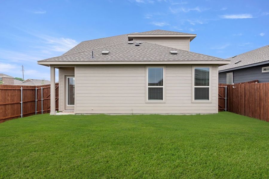 Representative exterior photo of a completed home built from the Willow by Impression Homes in Creekside Ranch, Blue Ridge, TX (Image 24).