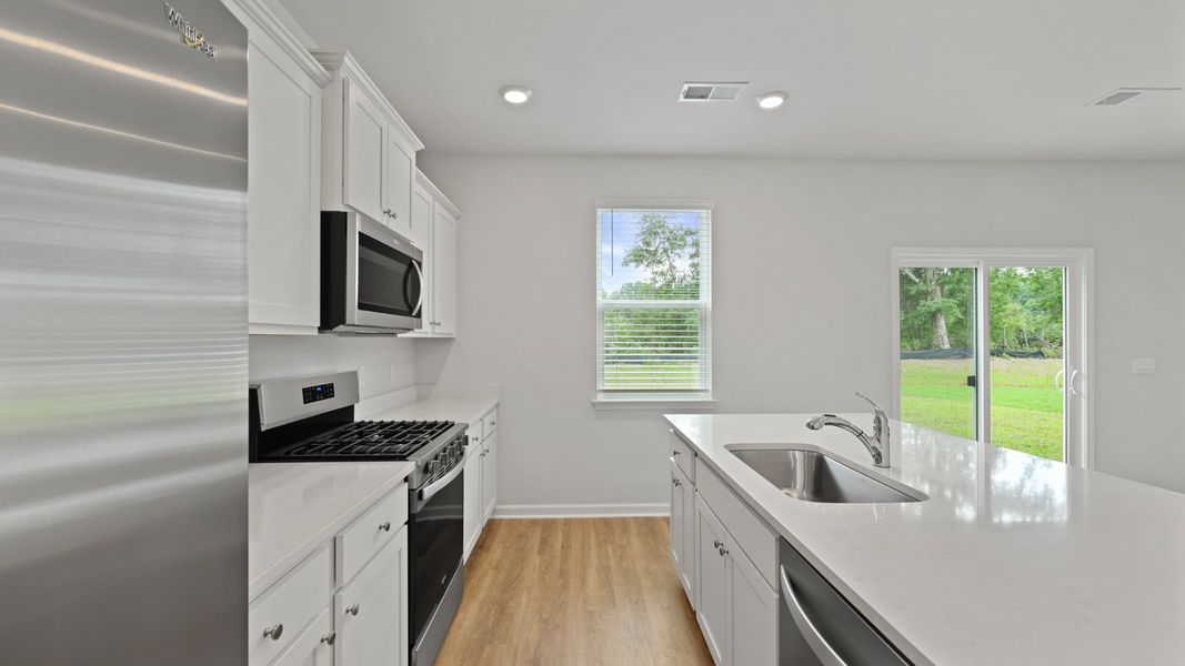 Representative furnished interior of a home built from the BELHAVEN by D.R. Horton in Pineview North, Summerville (Image 6). Representative furnished interior of a home built from the BELHAVEN by D.R. Horton in Pineview North, Summerville (Image 6).