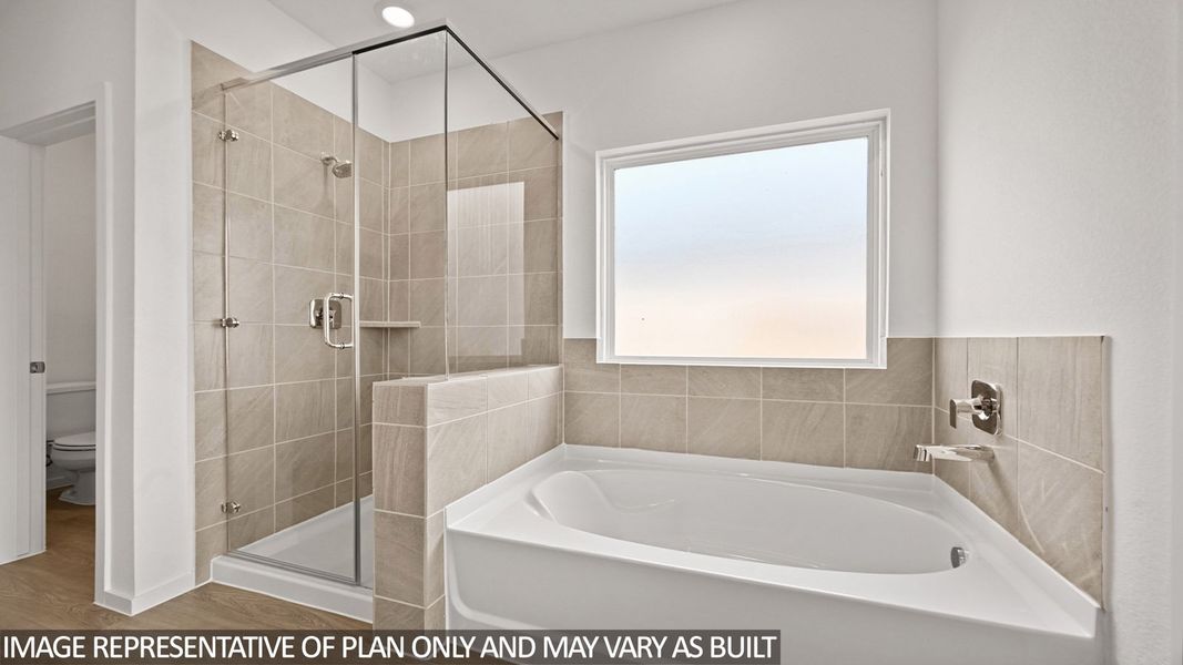 Furnished interior view inside a new home in Sunterra, Katy (Image 8).