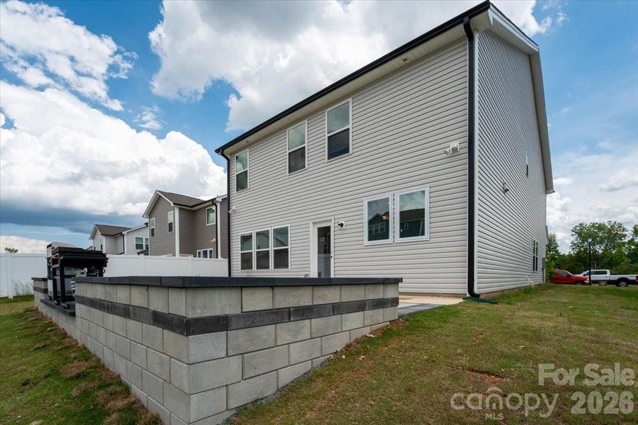 Exterior details and patio area of a home in , Oakboro (Image 31).