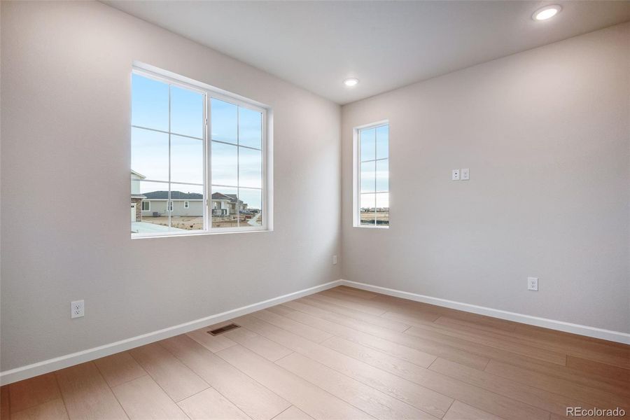 Spacious, unfurnished interior of a new home in Painted Prairie, Aurora (Image 40).