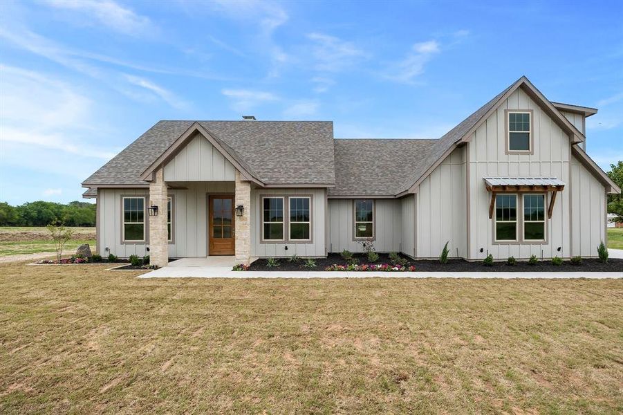 Front exterior of a new home in , Terrell, TX, highlighting curb appeal (Image 2). Front exterior of a new home in , Terrell, TX, highlighting curb appeal (Image 2).