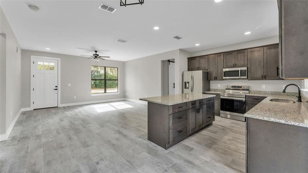 Furnished interior view inside a new home in , Winter Haven (Image 8). Furnished interior view inside a new home in , Winter Haven (Image 8).