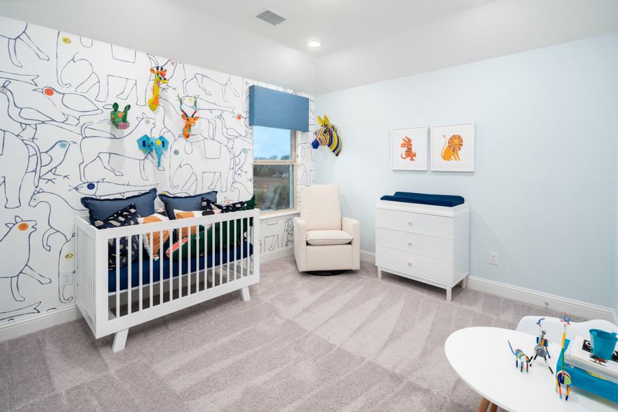 Representative furnished interior of a home built from the Kirby by UnionMain Homes in Lake Breeze, Lavon (Image 14).