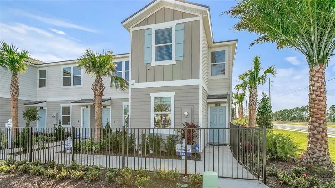 Front exterior of a new home in Stokes Landing, St. Augustine, FL, highlighting curb appeal (Image 2). Front exterior of a new home in Stokes Landing, St. Augustine, FL, highlighting curb appeal (Image 2).