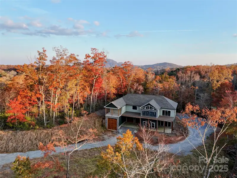 Front exterior of a new home in , Lake Lure, NC, highlighting curb appeal (Image 1).