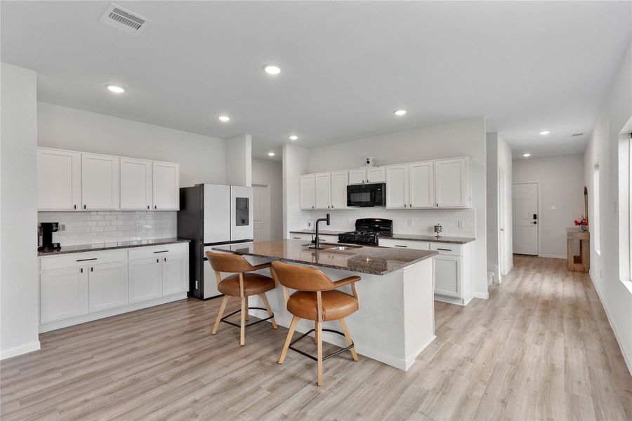 Furnished interior view inside a new home in Sweetgrass Village, Crosby (Image 8).
