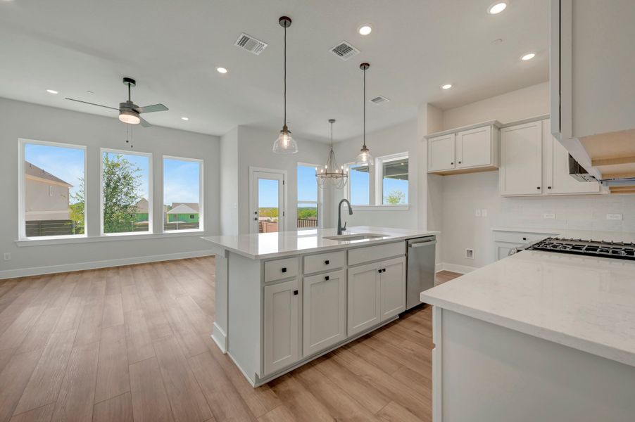 Furnished interior view inside a new home in Double Creek Crossing, Round Rock (Image 7).