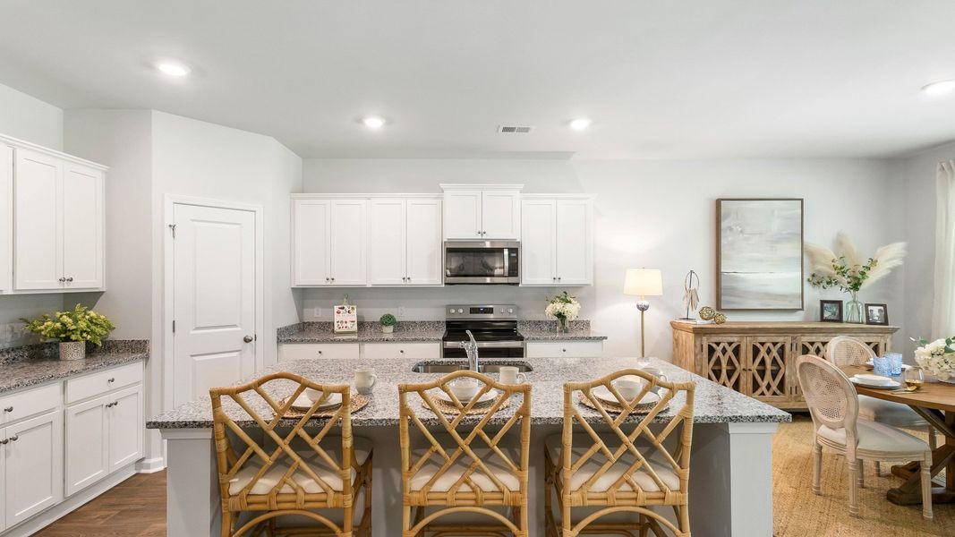 Furnished interior view inside a new home in Pine Hills at Cane Bay, Summerville (Image 3). Furnished interior view inside a new home in Pine Hills at Cane Bay, Summerville (Image 3).