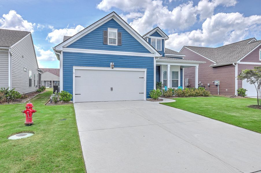 Front exterior of a new home in , Summerville, SC, highlighting curb appeal (Image 22).