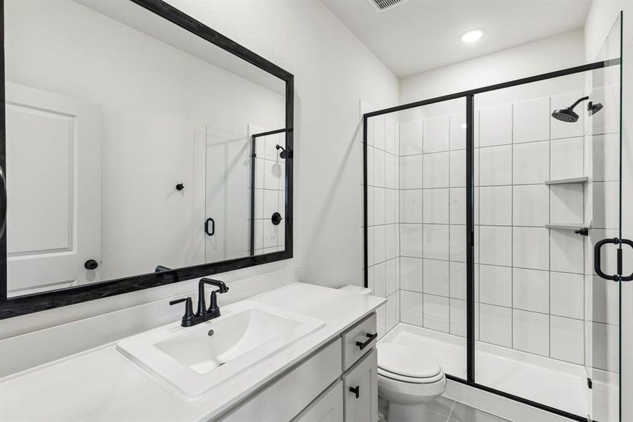 Guests will feel right at home in either of the beautifully finished guest baths in our Montclair plan. Guests will feel right at home in either of the beautifully finished guest baths in our Montclair plan.