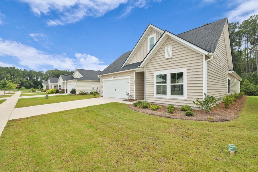 Front exterior of a new home in , Summerville, SC, highlighting curb appeal (Image 20).