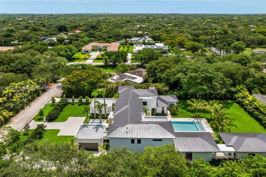 Front exterior of a new home in , Pinecrest, FL, highlighting curb appeal (Image 31).