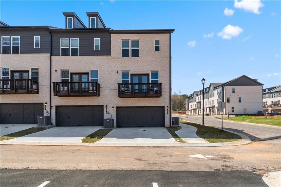 Front exterior of a new home in Daybreak, Newnan, GA, highlighting curb appeal (Image 25).