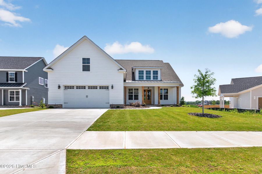 Front exterior of a new home in Highland Lakes, Evans, GA, highlighting curb appeal (Image 27).