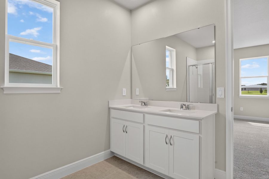 Furnished interior view inside a new home in Windwater, Parrish (Image 11).
